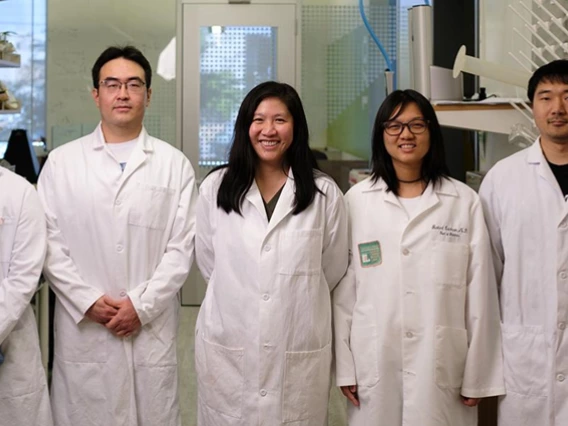 Associate professor of biomedical engineering and optical sciences, Judith Su (center), leads research on the FLOWER sensing device.