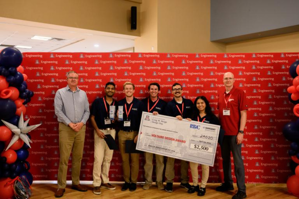 Team 24020 celebrates their $2,500 prize for the RBC Sargent Aerospace & Defense Voltaire Design Award.