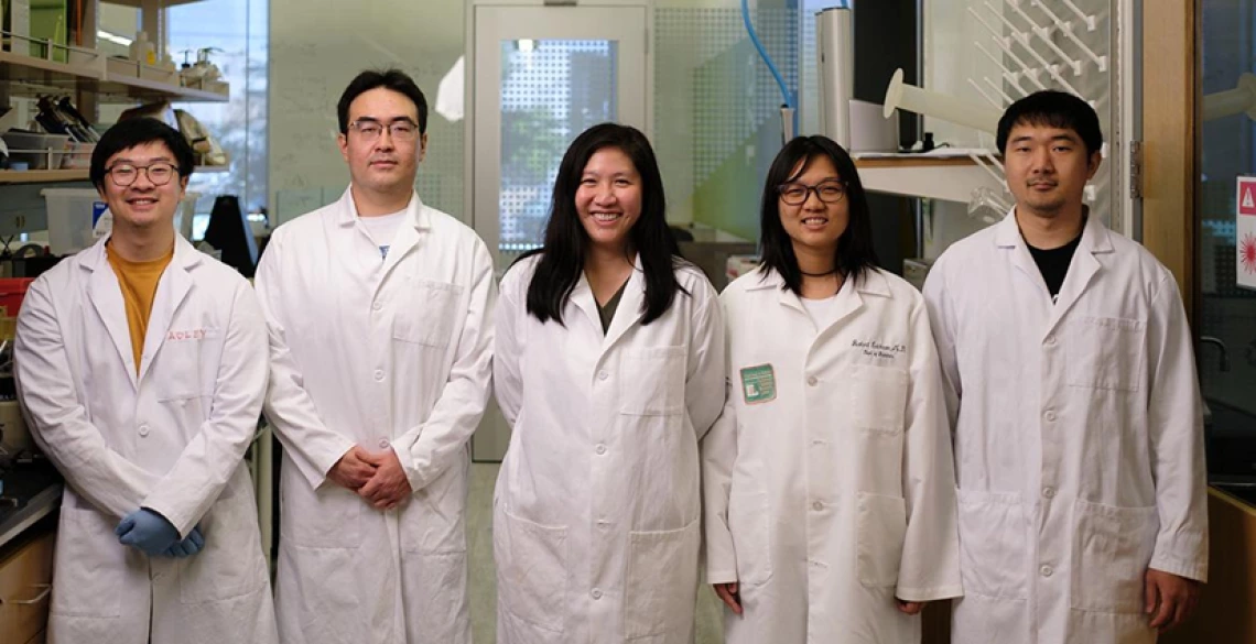 Associate professor of biomedical engineering and optical sciences, Judith Su (center), leads research on the FLOWER sensing device.