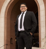 Gerardo Figueroa posing for a photo on the University of Arizona campus