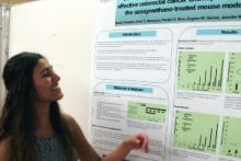Swati Chandra presenting a poster of her research